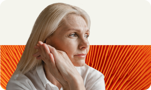 A woman propping up her head with her hands