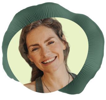 Middle-aged woman smiling.