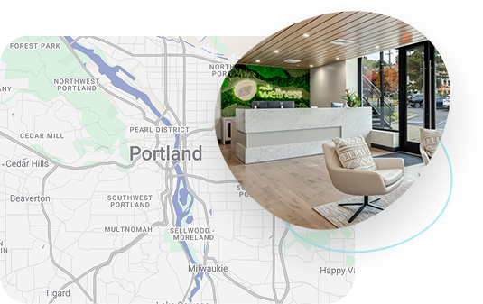 Reception desk with map of Portland, Oregon area in background.